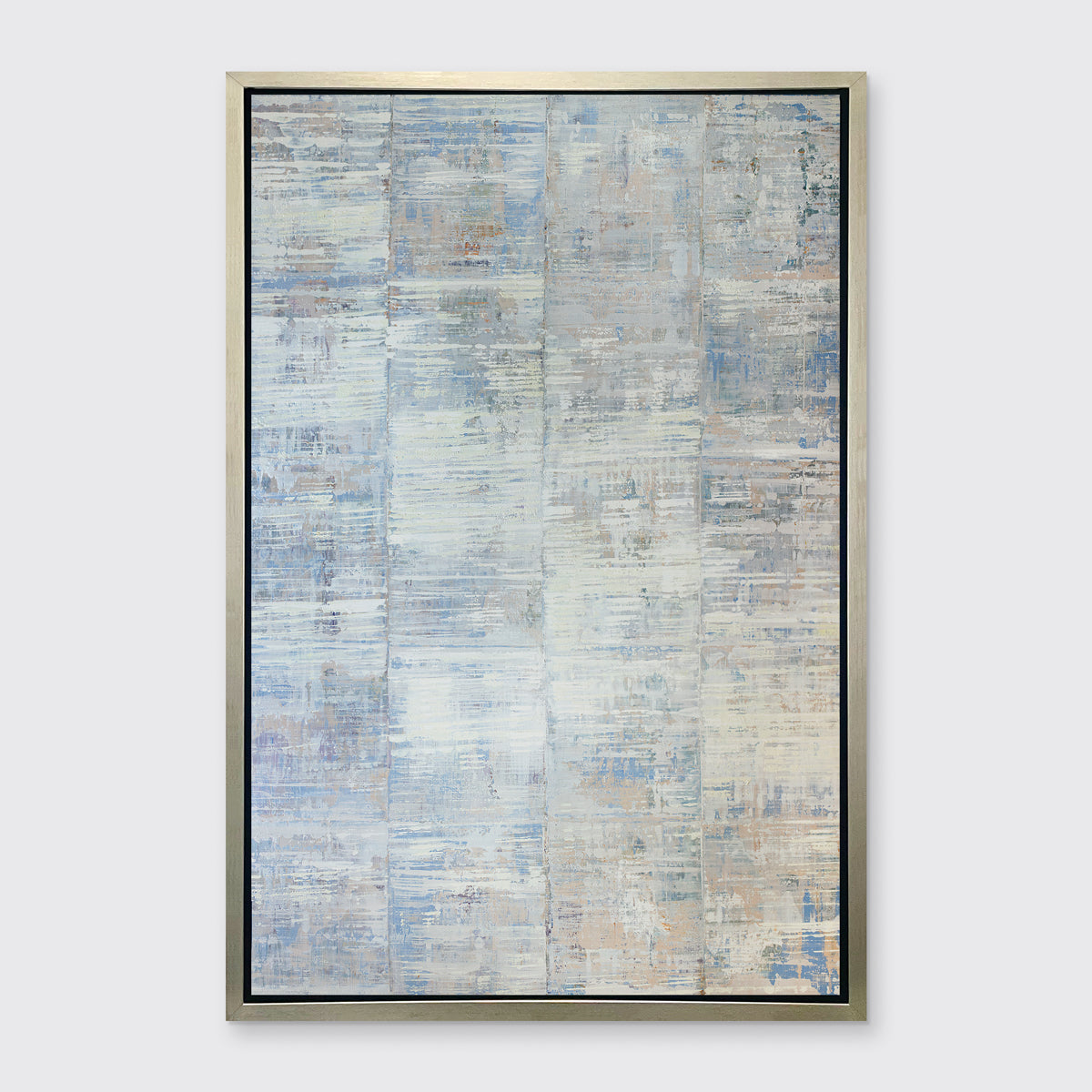 A white and blue abstract print in a silver floater frame hangs on a white wall.