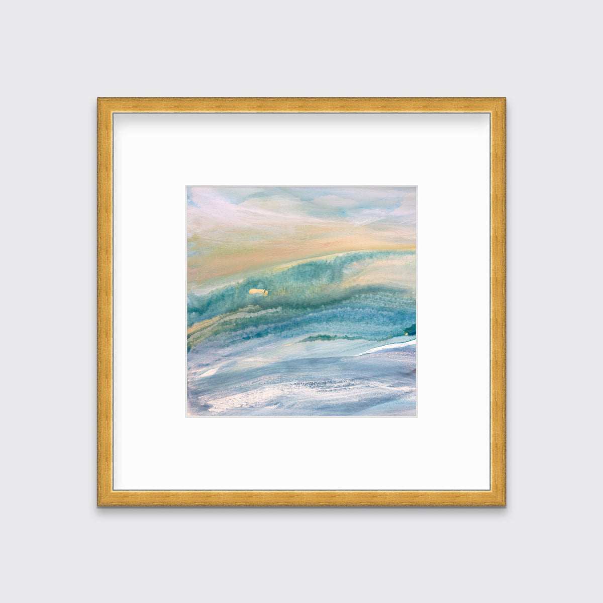A blue, teal, yellow and white abstract print in a gold frame with a mat hangs on a white wall.