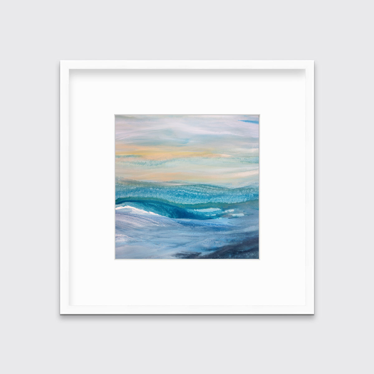 A blue, teal, yellow and white abstract print in a white frame with a mat hangs on a white wall.