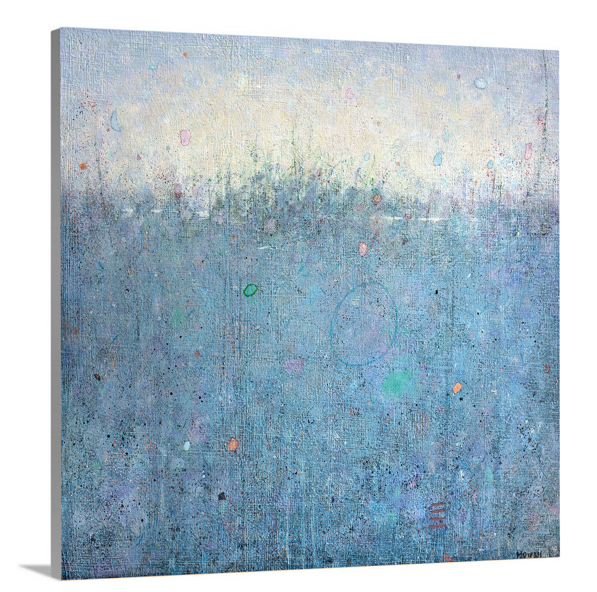 A side-angle view of a blue abstract landscape print on canvas.
