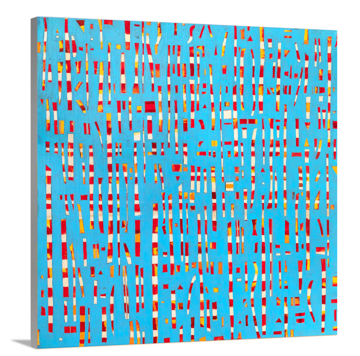 A side-angle view of a blue, red, yellow and white abstract print on canvas.