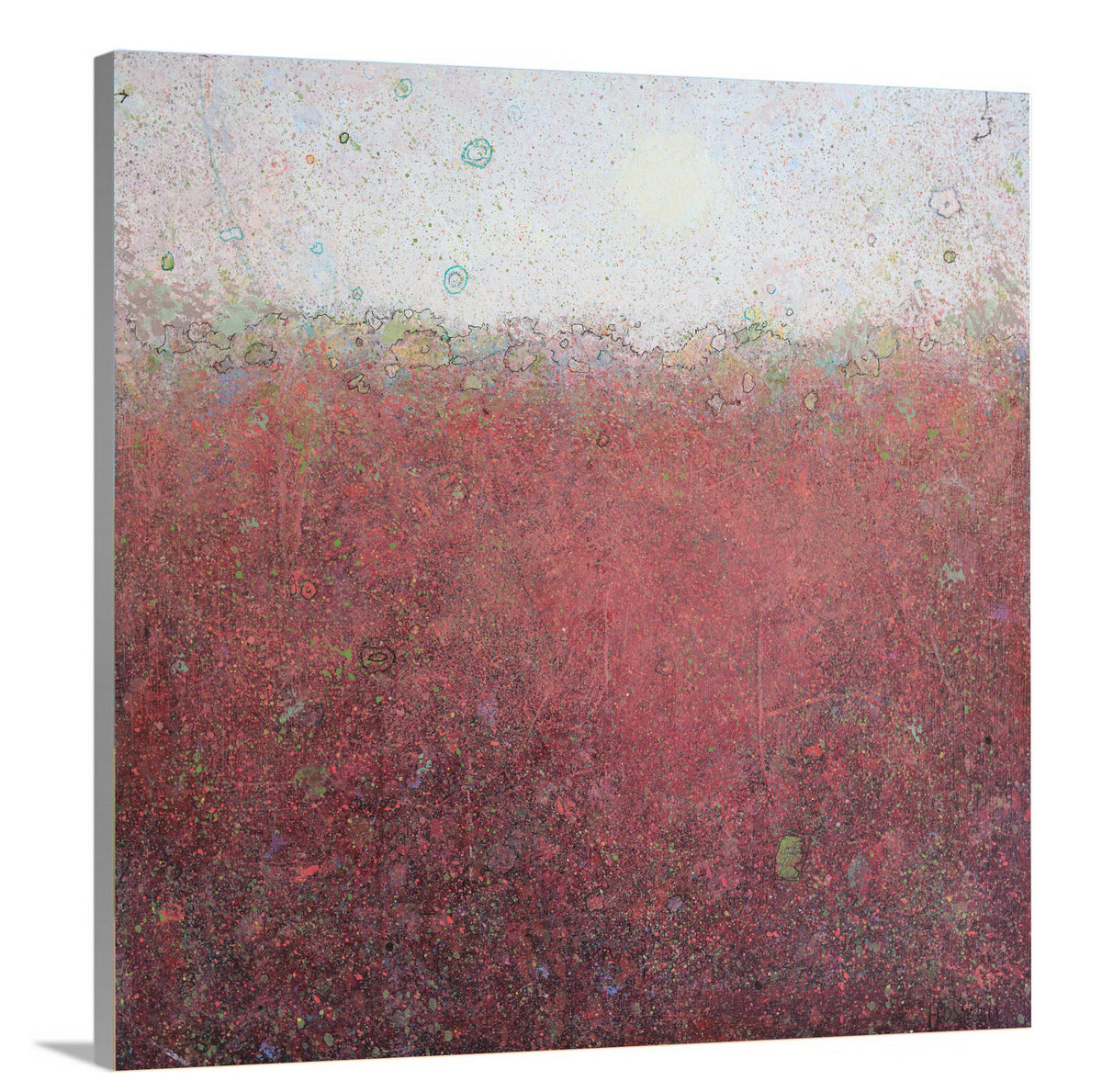A side-angle view of a red abstract landscape print by Elwood Howell on canvas.