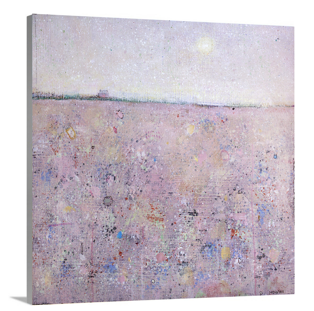 A side-angle view of a pink abstract landscape print on canvas.