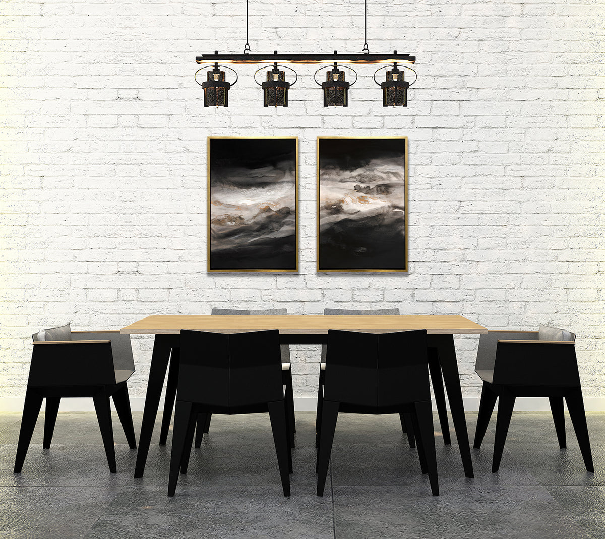 Two black, white, beige and gold abstract prints in a gold floater frames hang side by side on a white brick wall above a wood table with six black modern chairs.