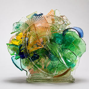 Colorful glass sculpture on a white table