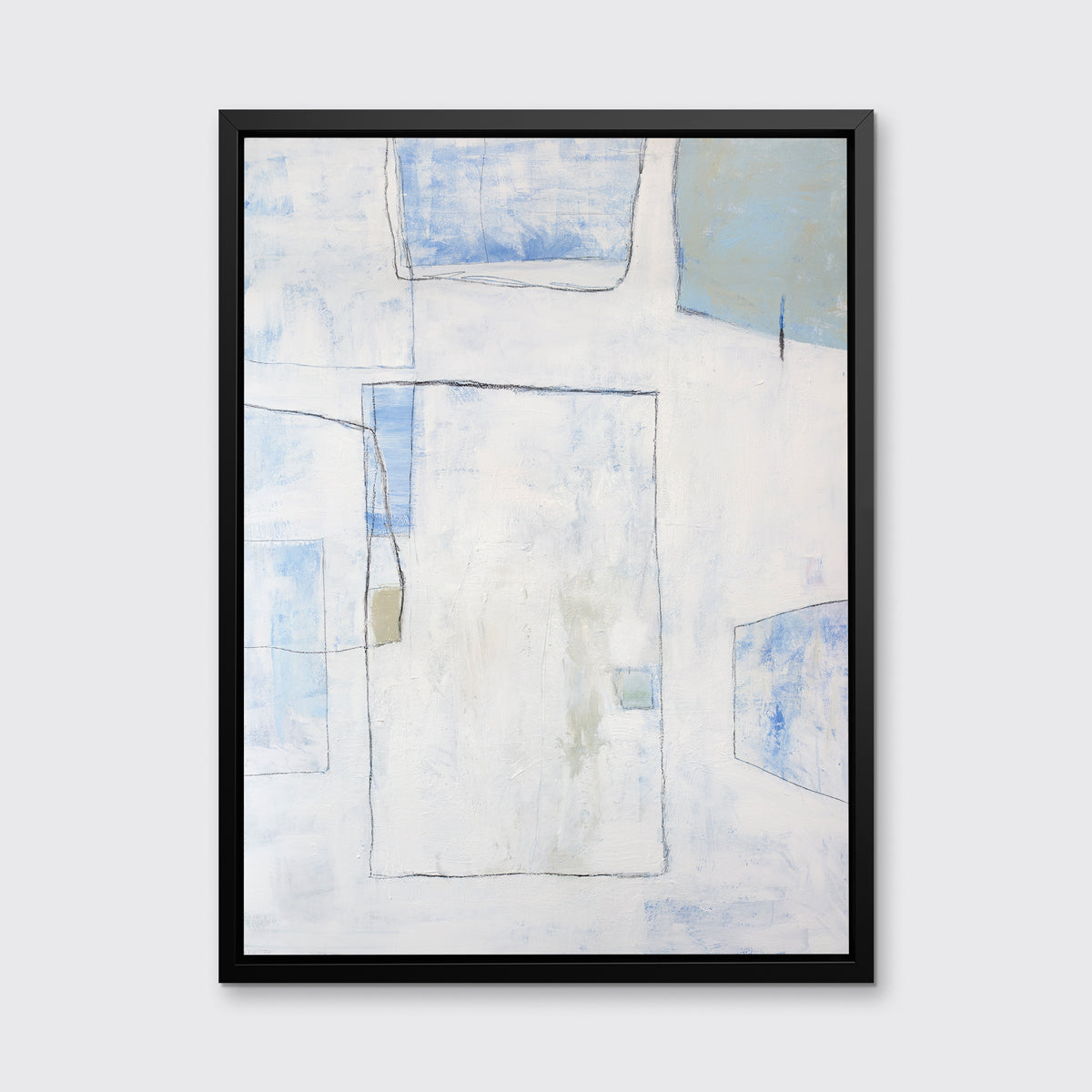 A white, blue and green abstract print in a black floater frame hangs on a white wall.