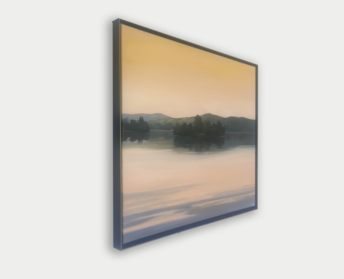 Framed artwork of a landscape with a lake and trees on a white background