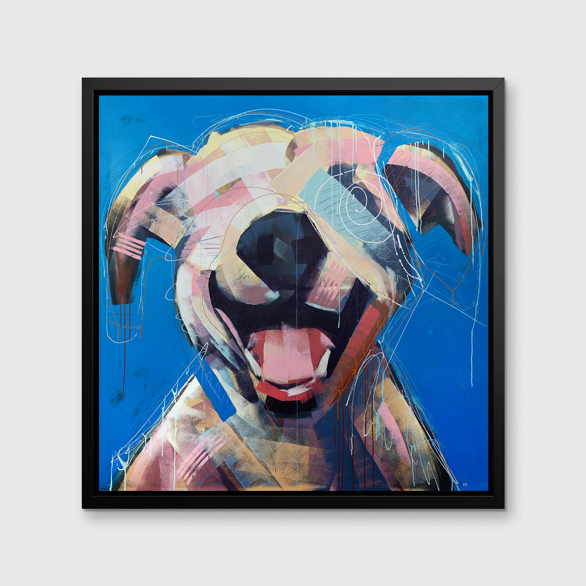 A yellow-orange, pink, red and blue abstract dog print in a black floater frame hangs on a white wall.