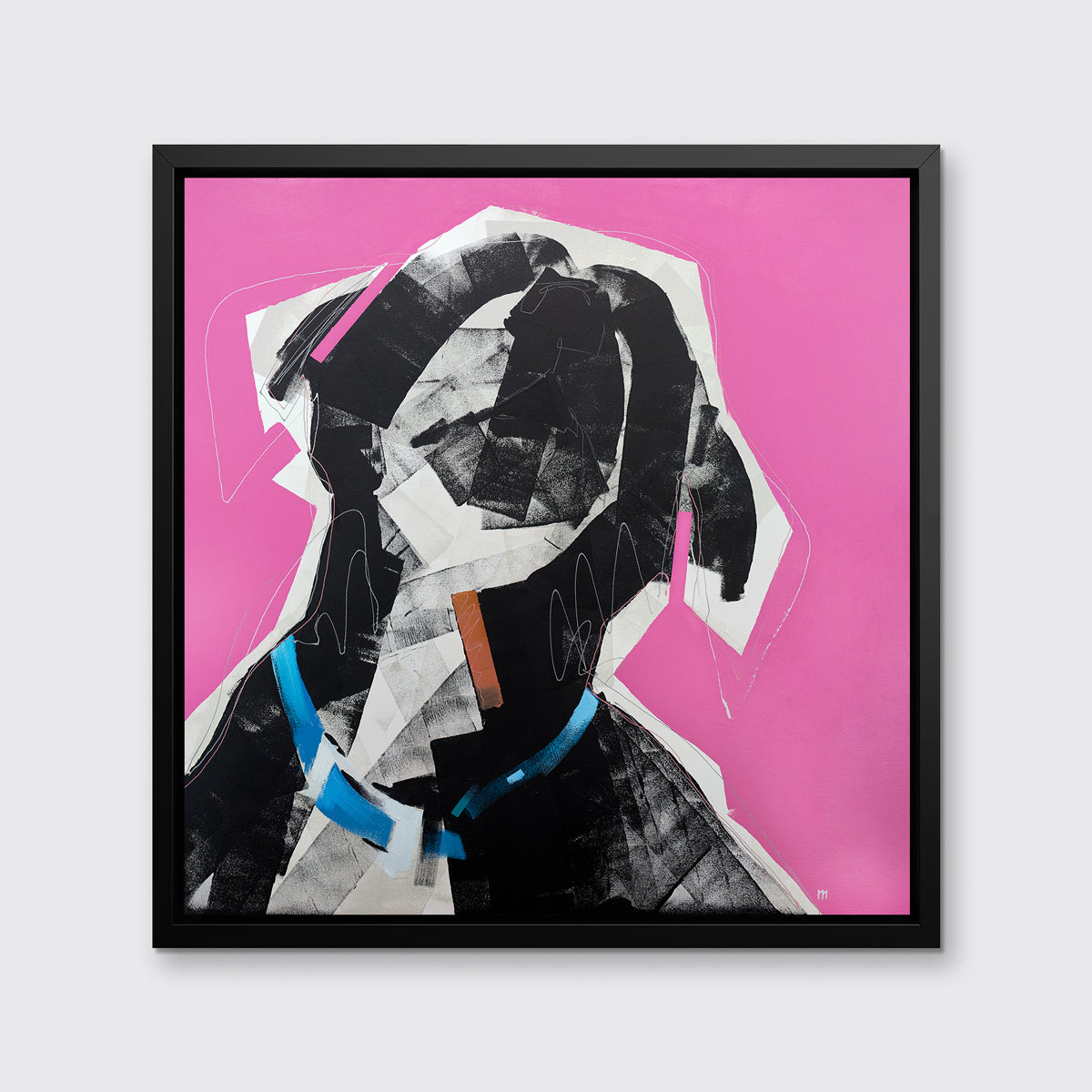 A pink, black, white and blue abstract dog print in a black floater frame hangs on a white wall.