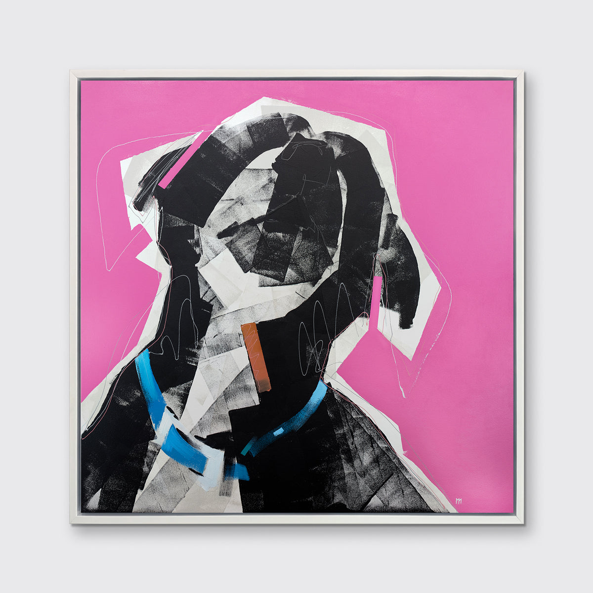 A pink, black, white and blue abstract dog print in a white floater frame hangs on a white wall.