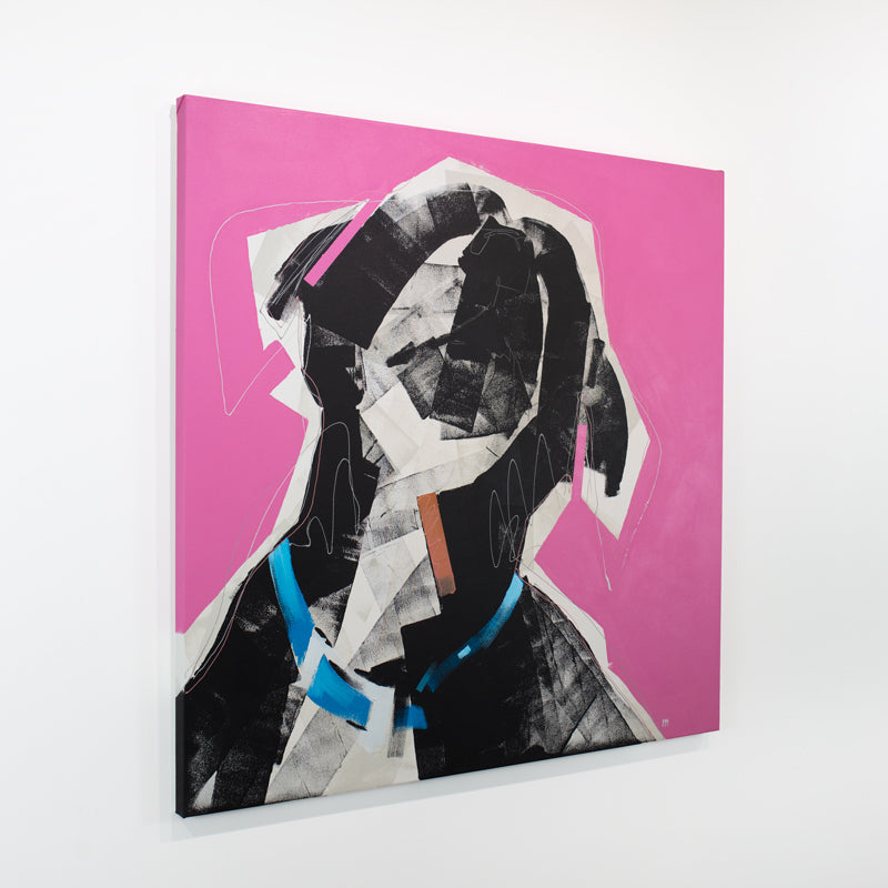 A large abstracted painting of a black and white dog with a blue collar on a bright pink background hangs on a white wall.