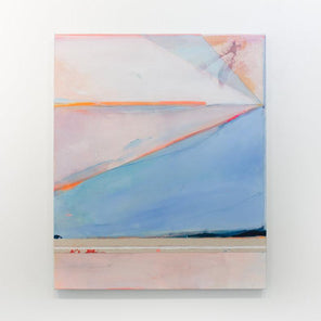 A pink and blue abstract painting hangs on a white wall. 