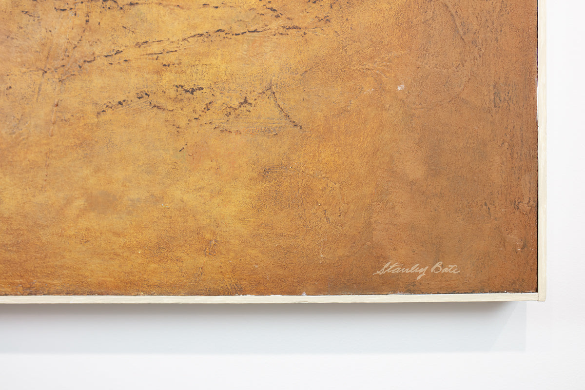 The bottom right corner of a warm yellow abstract painting by Stanley Bate which displays the artist's signature. 