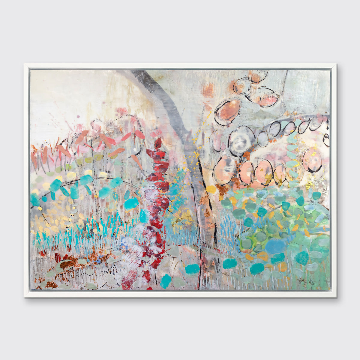 A multicolored abstract floral print in a white floater frame hangs on a white wall.