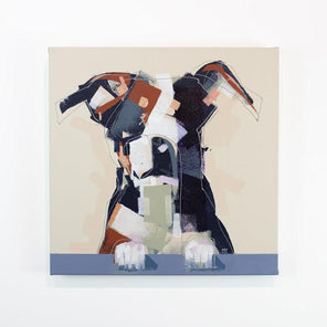 An abstracted painting of a dog hangs on a white wall. 