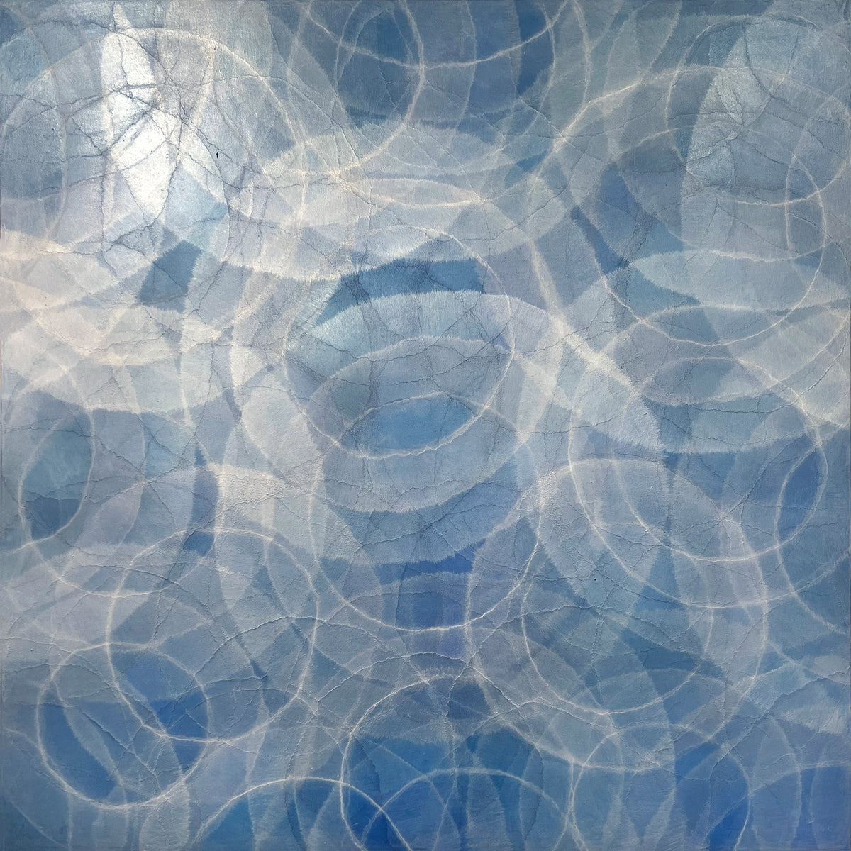 Abstract original painting of blue and gray circles on a textured background