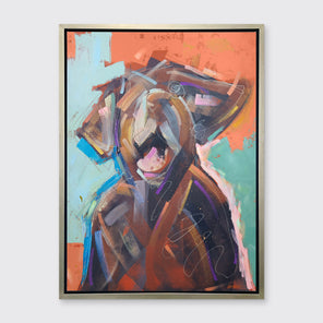 A orange, brown, teal and light pink abstract dog print in a silver floater frame hangs on a white wall.