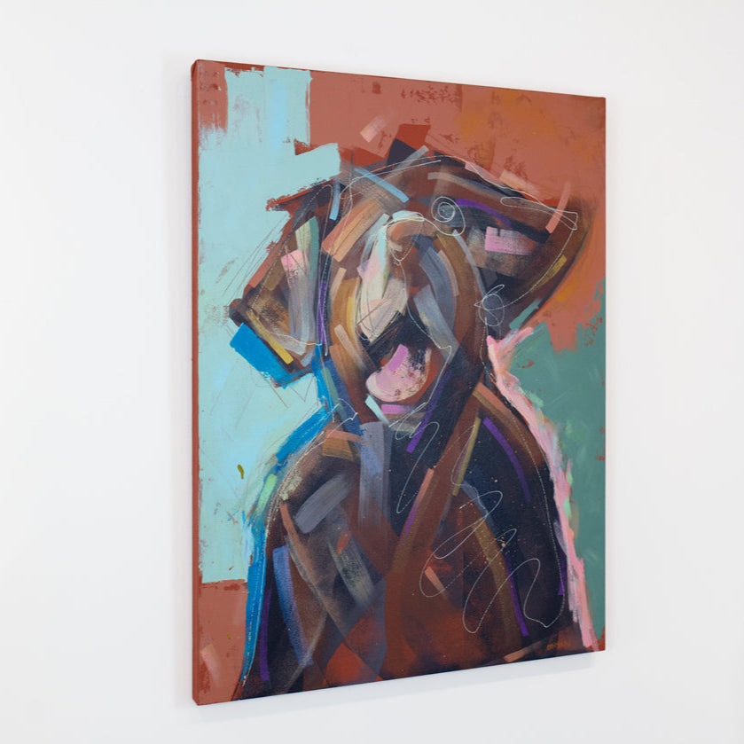 An abstracted red and teal painting of a dog hangs on a white wall.