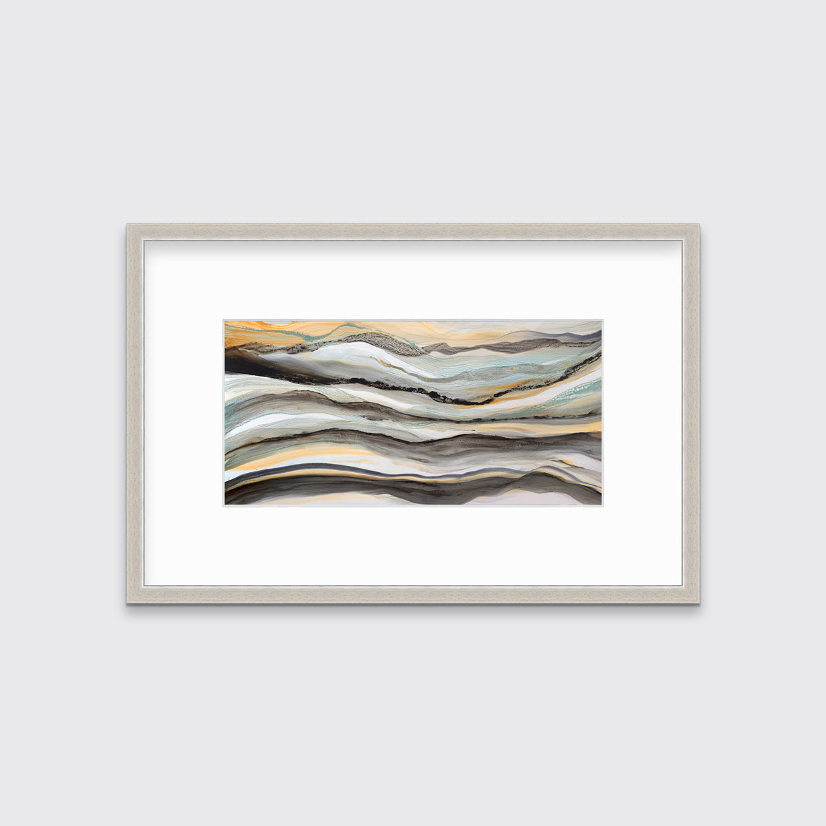 A black, white, orange and teal abstract print in a silver frame with a mat hangs on a white wall.