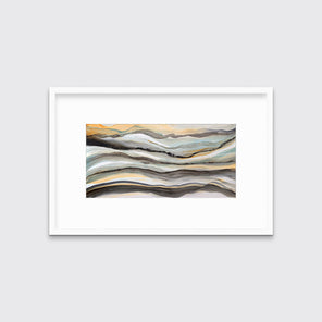 A black, white, orange and teal abstract print in a white frame with a mat hangs on a white wall.