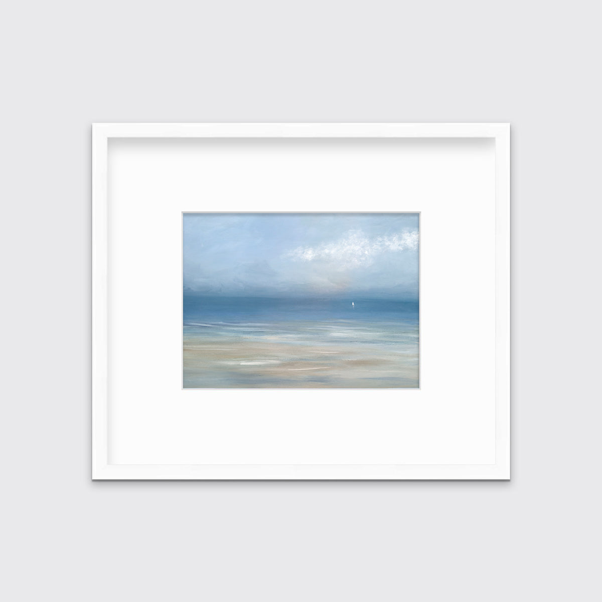 A light blue, white and beige abstract seascape print in a white frame with a mat hangs on a white wall.