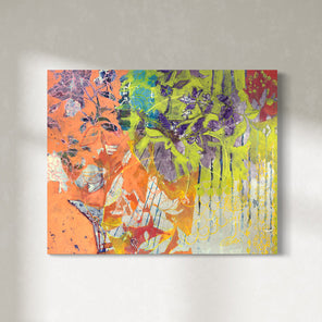 A painting is hung on the gallery wall. Beautiful floral motifs in neon green, purple, orange, and blue adorn the painting. The painting is wired and ready to hang.