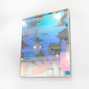 A blue and pink fine art mirror on a white wall. 