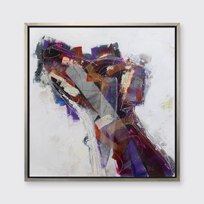 A white, purple, grey and dark orange abstract dog print in a silver floater frame hangs on a white wall.