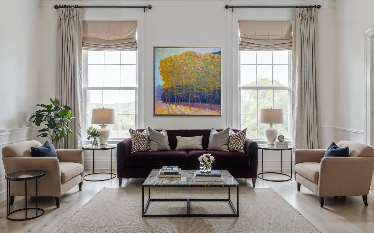 Living room with a dark brown sofa, beige armchairs, and a colorful abstract painting on the wall.