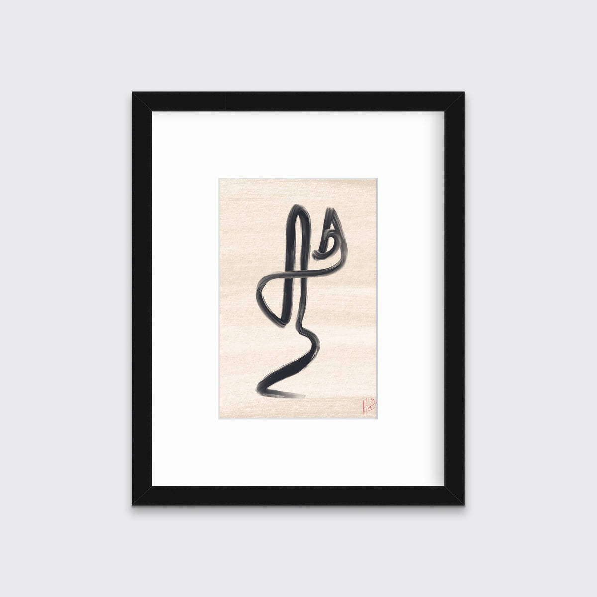 A black minimalistic print by Hazal Ozturk framed in a black frame hangs on a light grey wall. 