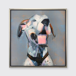 A white, light pink, grey and brown abstract dog print in a silver floater frame hangs on a white wall.