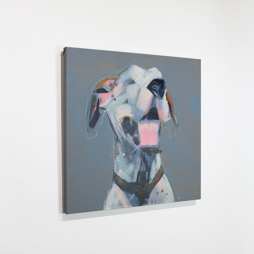 An abstracted painting of a dog hangs on a white wall.