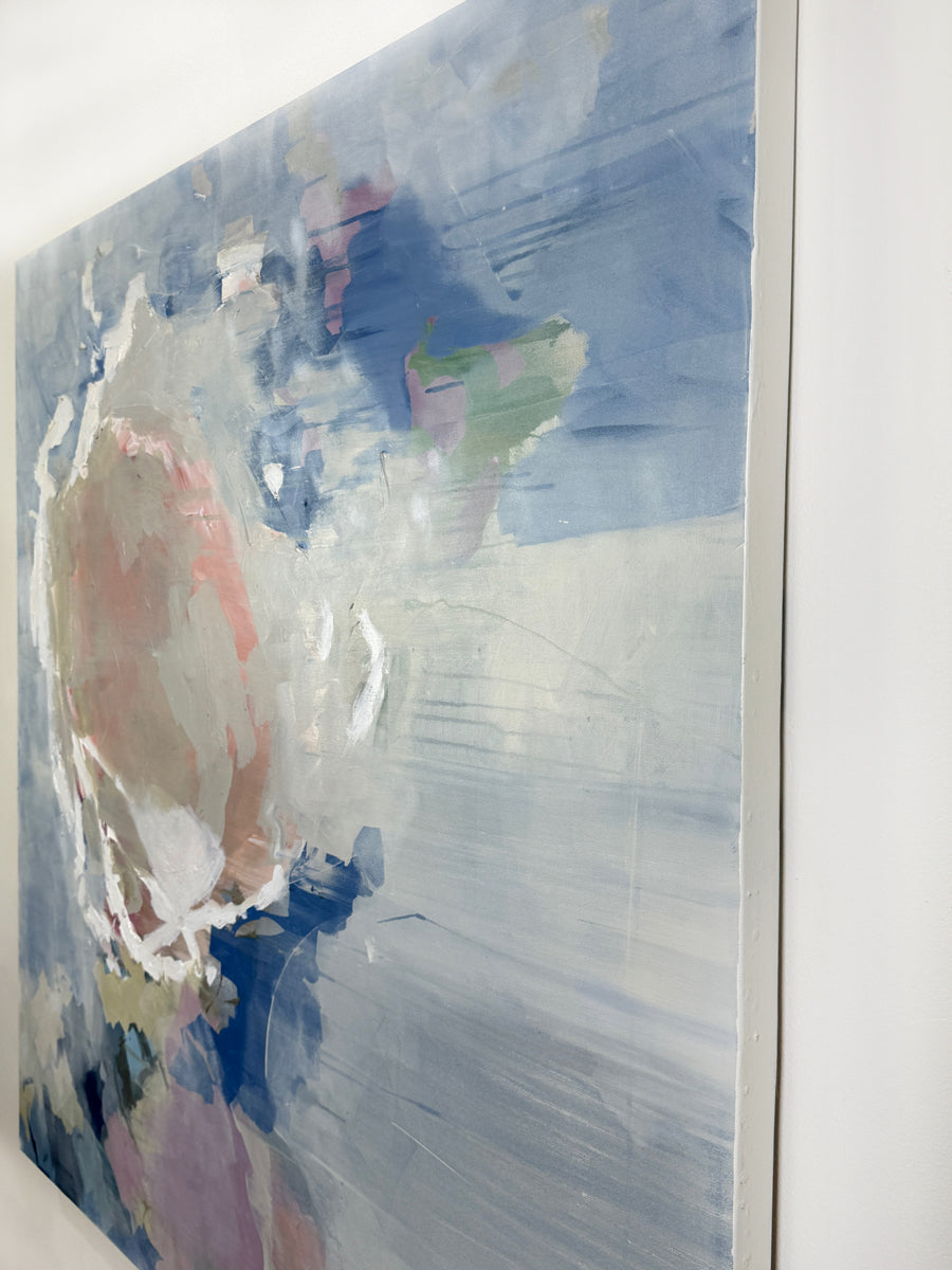 Abstract painting with soft pastel colors on a white wall