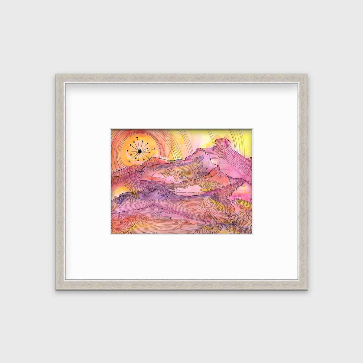 A pink, yellow and orange abstract landscape print with black outlines in a silver frame with a mat hangs on a white wall.