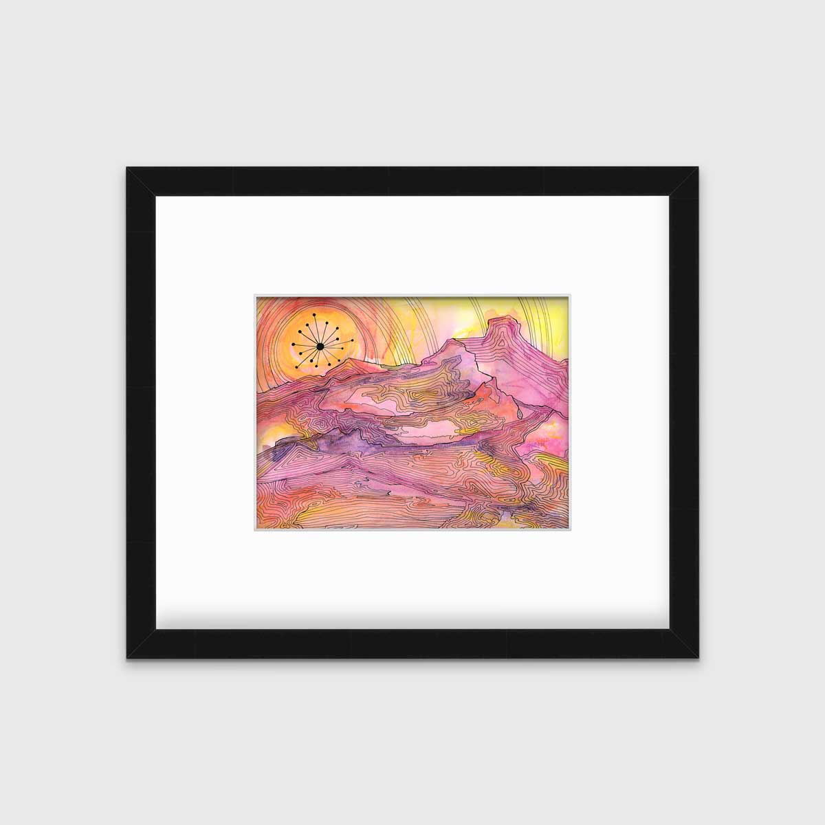 A pink, yellow and orange abstract landscape print with black outlines in a black frame with a mat hangs on a white wall.