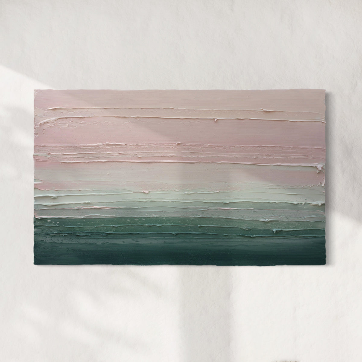 A light Coral, light pink, celadon and hunter green thickly textured abstract painting by Teodora Guererra hanging on a white wall.