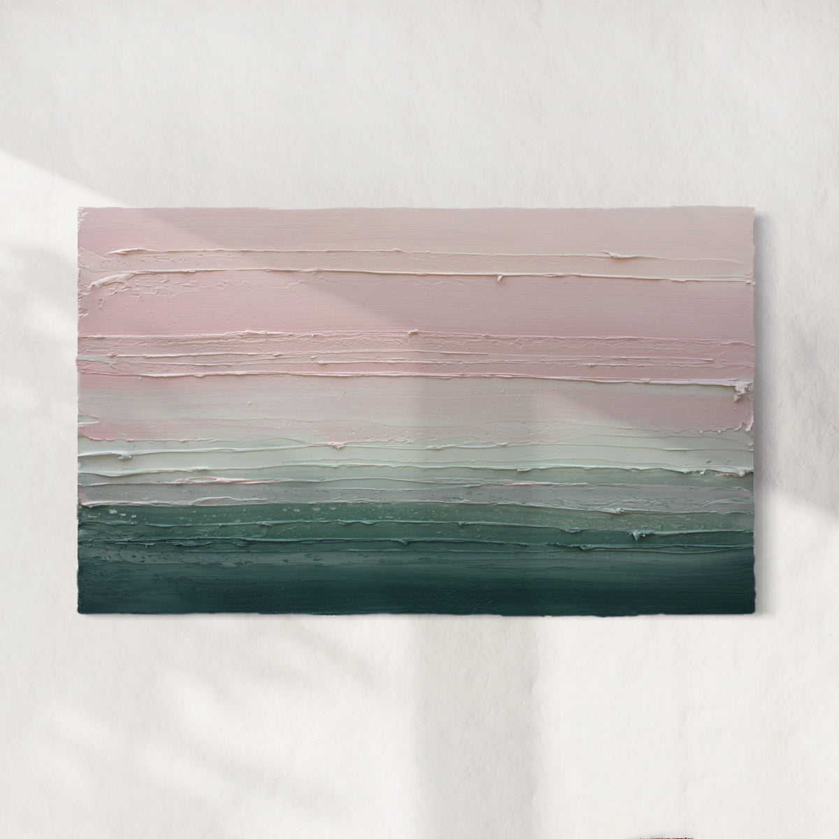 A light Coral, light pink, celadon and hunter green thickly textured abstract painting by Teodora Guererra hanging on a white wall.