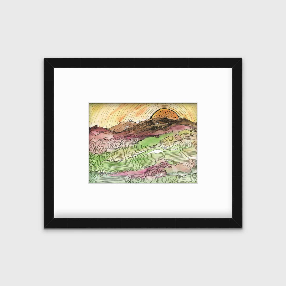 A yellow, brown, green and dark rose abstract landscape print with black outlines in a black frame with a mat hangs on a white wall.