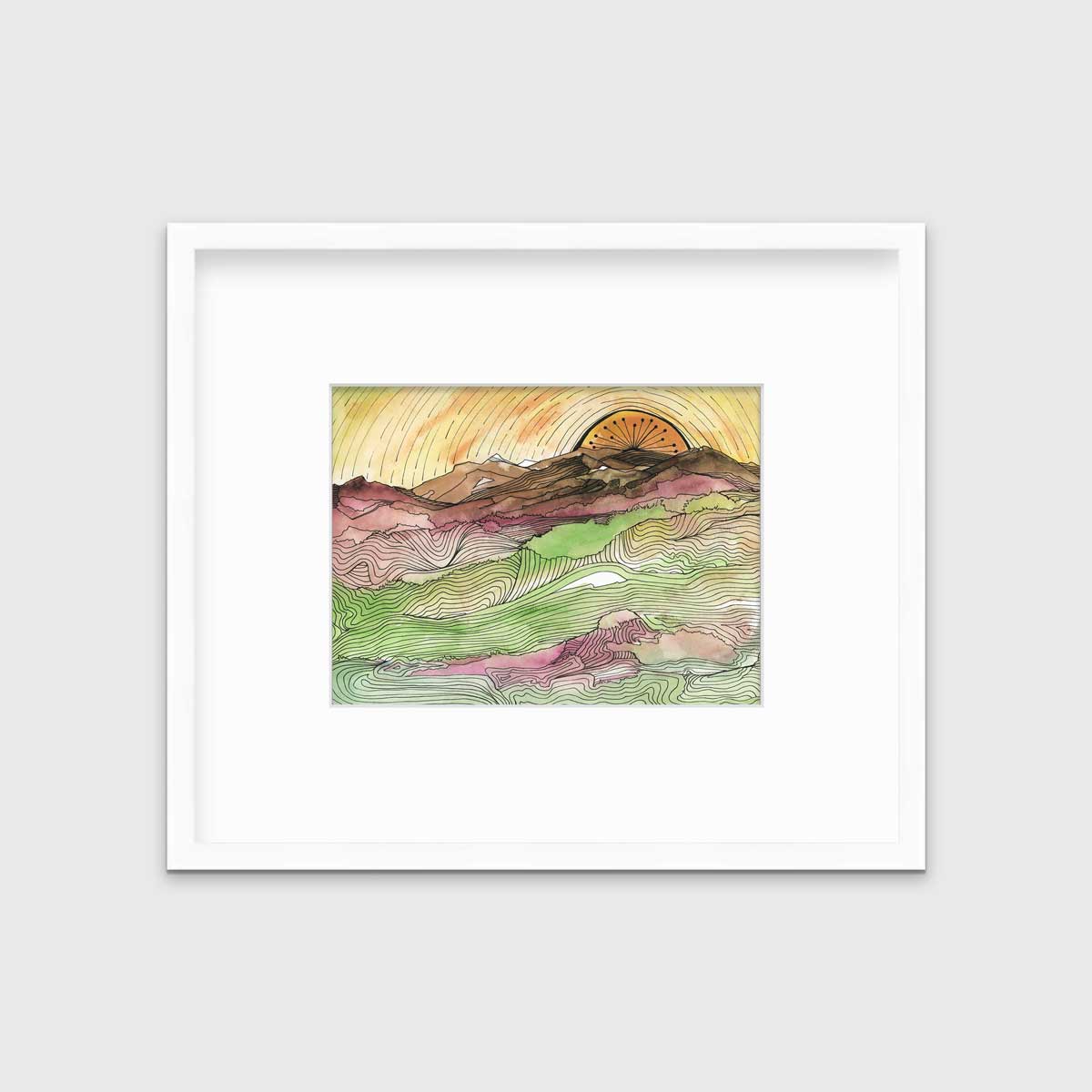 A yellow, brown, green and dark rose abstract landscape print with black outlines in a white frame with a mat hangs on a white wall.