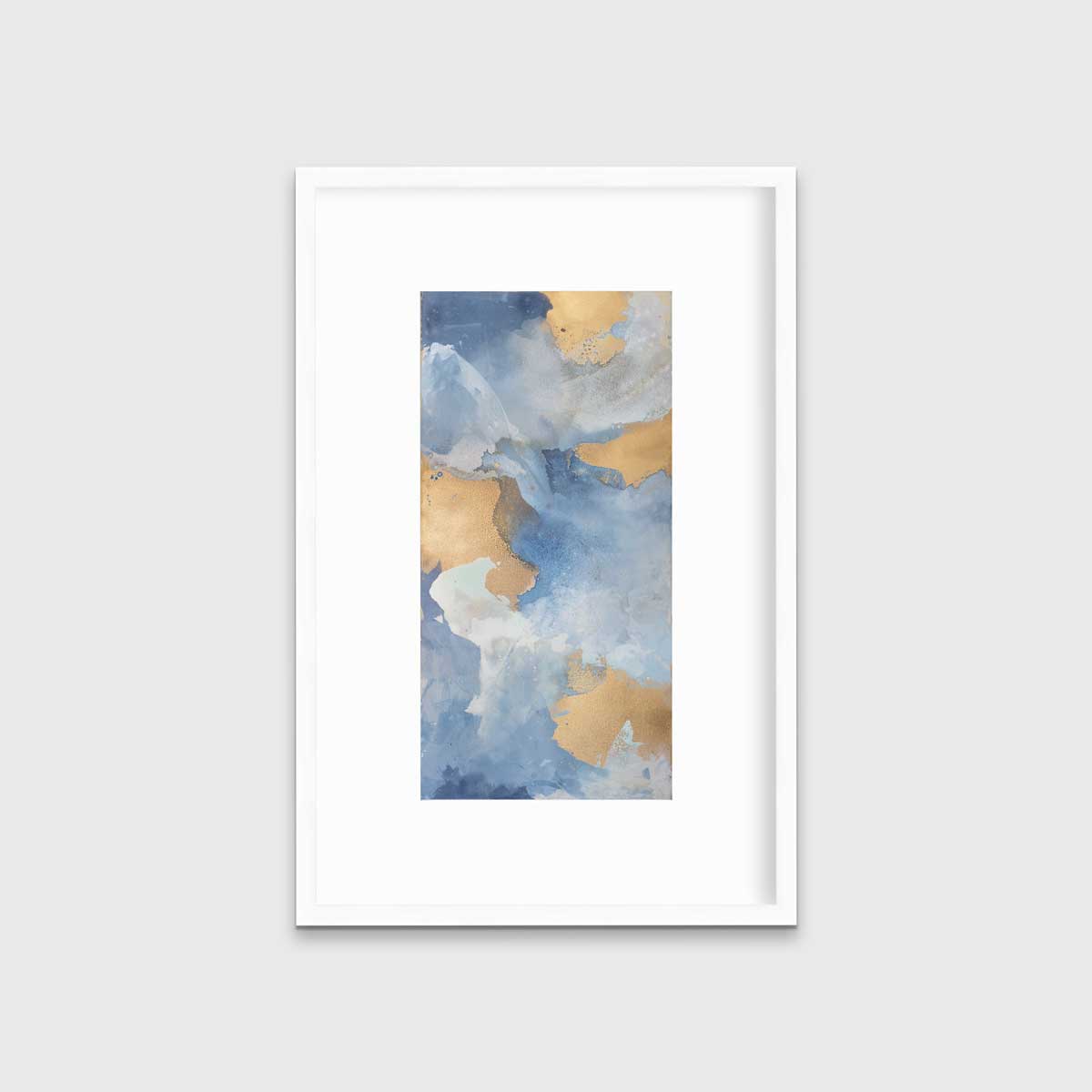 A blue, teal, beige and gold abstract print in a white frame with a mat hangs on a white wall.