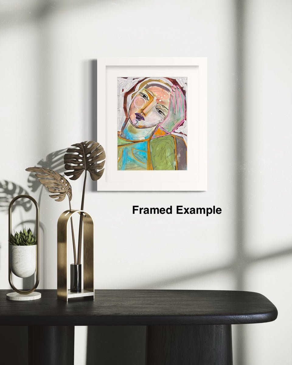 Framed abstract art print on a wall with decorative elements below.