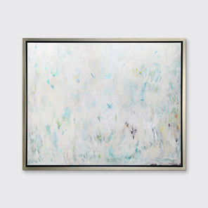 A white, light blue and light green abstract landscape print in a silver floater frame hangs on a white wall.