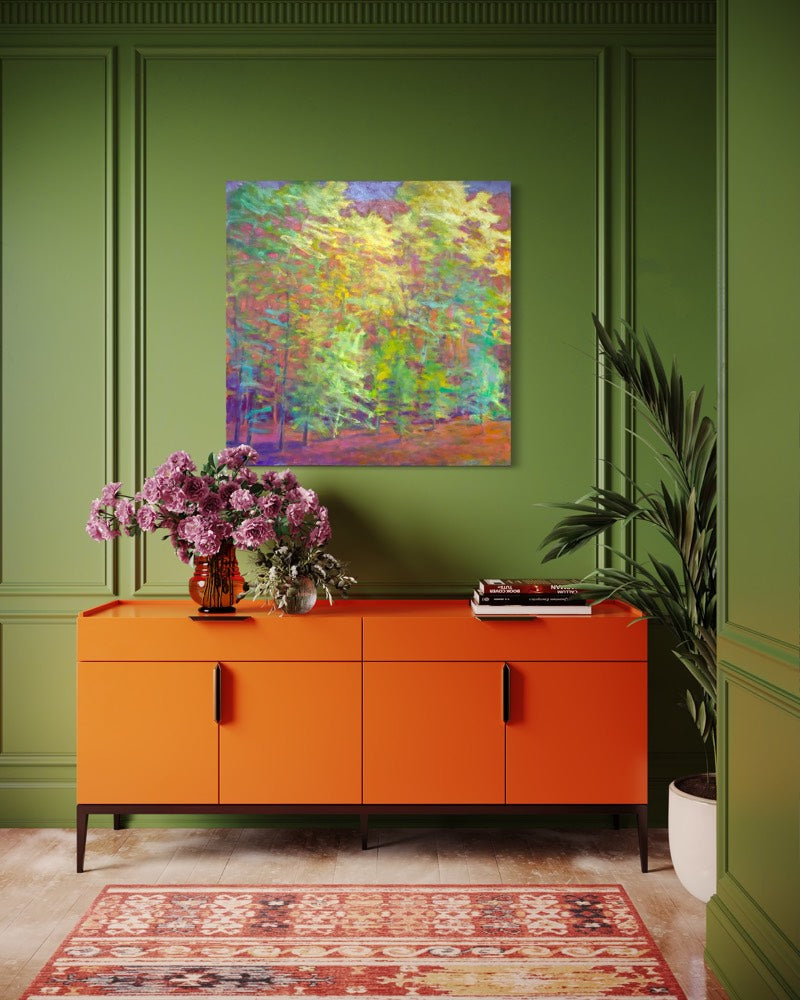 Orange cabinet with flowers and a colorful painting on a green wall