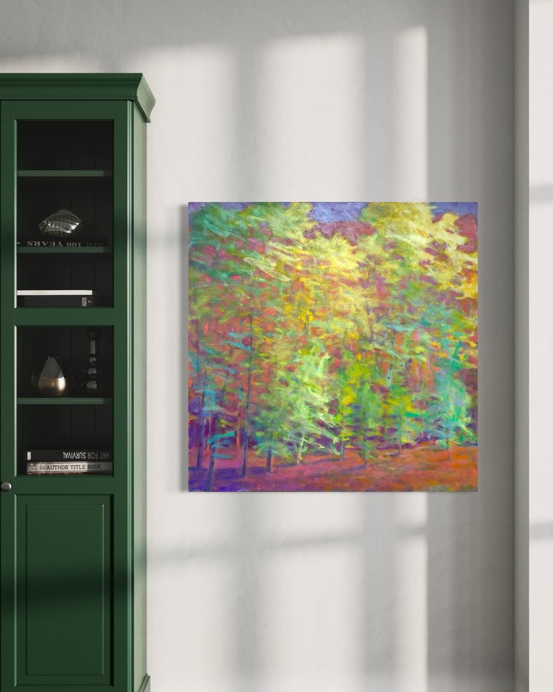 Colorful abstract painting on a wall next to a green cabinet.