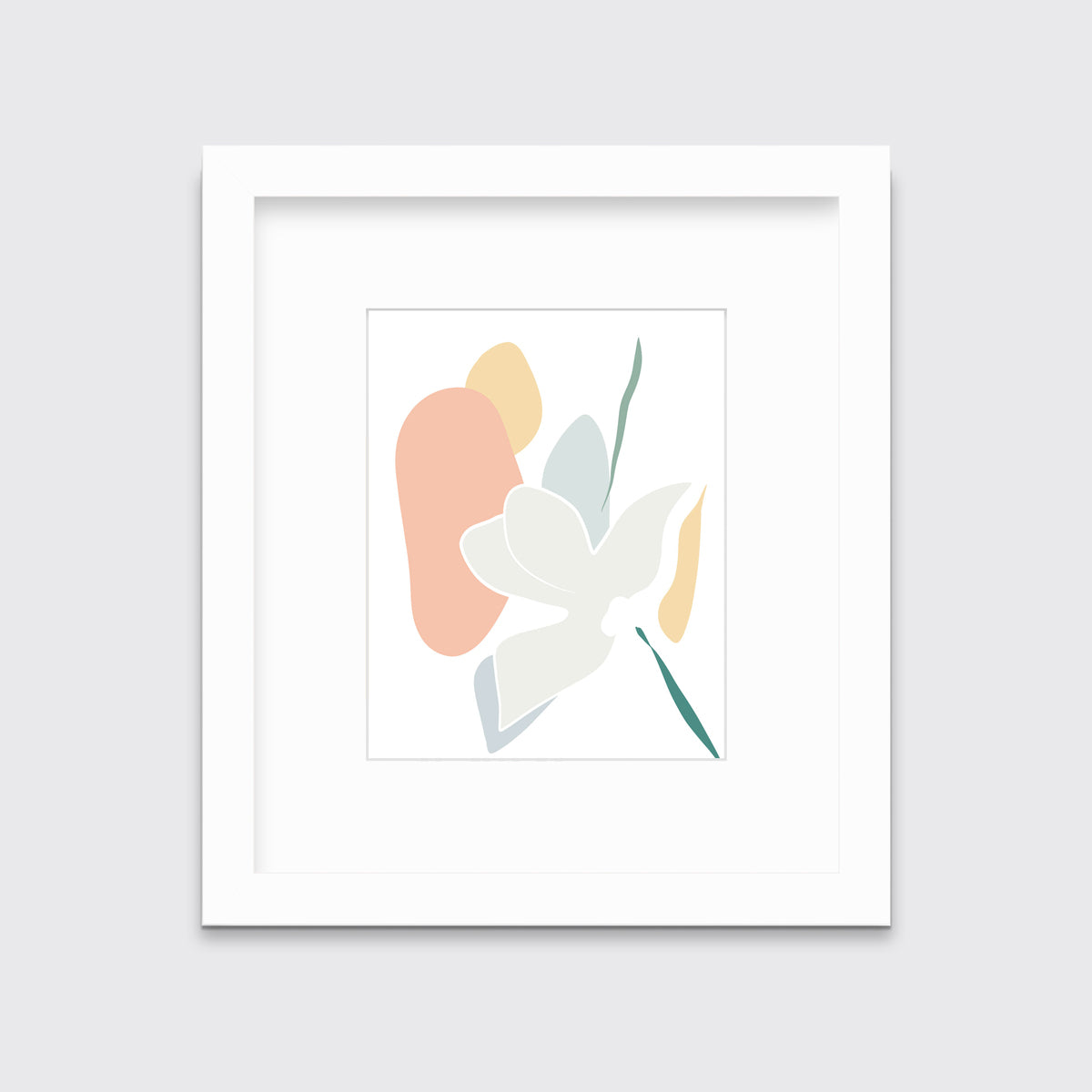 A light abstract botanical art print in a white frame with a mat hangs on a white wall.