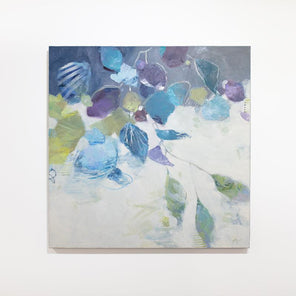 A blue, purple, teal and green abstract floral painting by Kay Flierl hangs on a white wall.