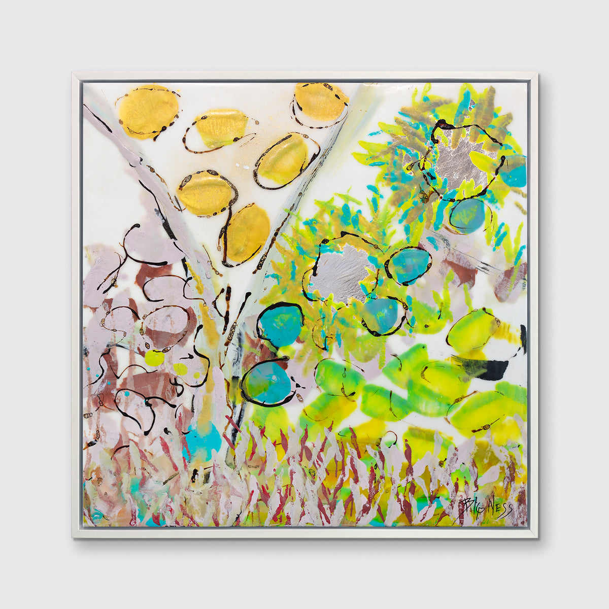A yellow, green and red abstract floral print in a white floater frame hangs on a white wall.