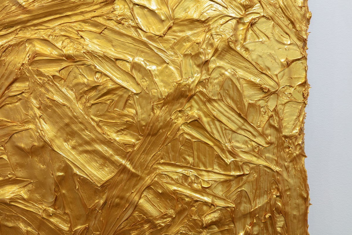 A detail shot of a metallic golden thick textured painting by Teodora Guererra.