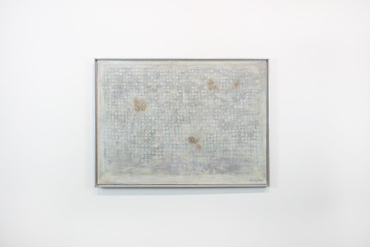 A light grey abstract painting hangs in a white floater frame on a white wall. 