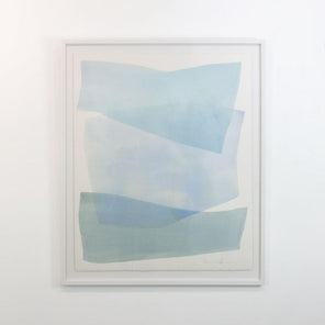 A watercolor painting of blue and turquoise stacked forms painted by Nealy Hauschildt is hung on a gallery wall.